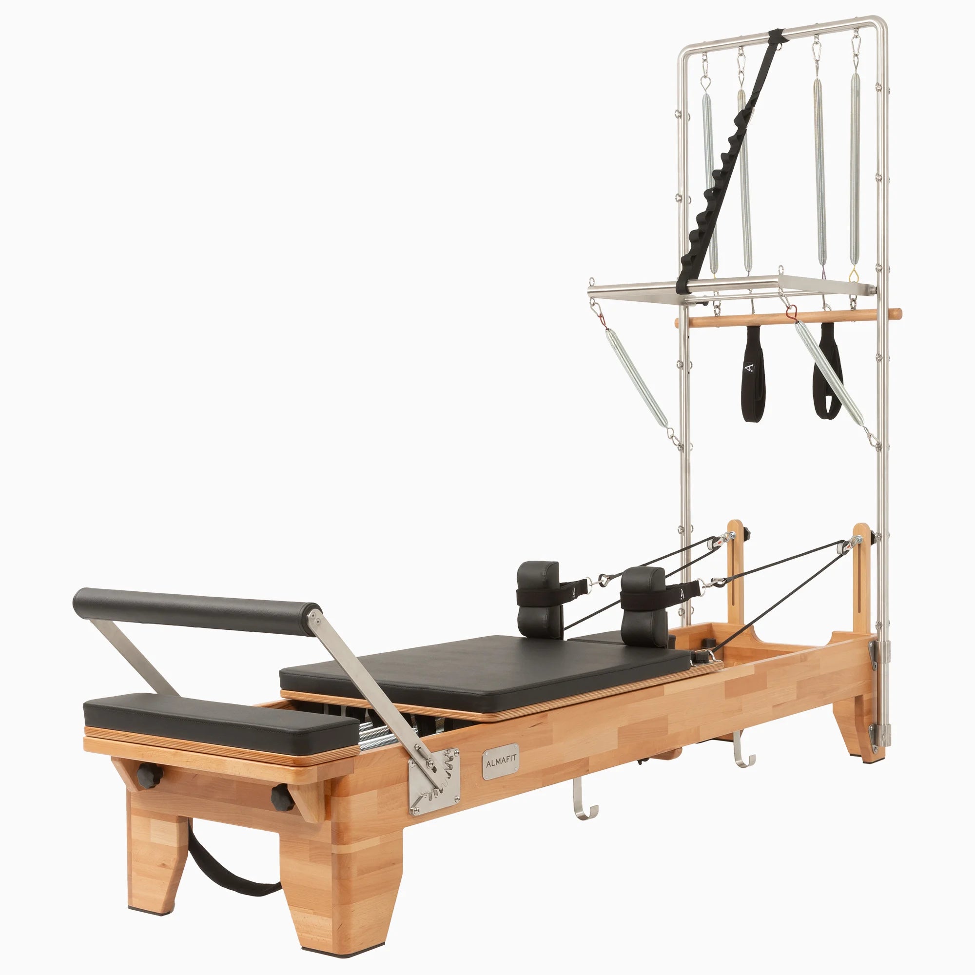 Almafit Elysium Tower Reformer, a wooden Pilates Reformer machine with a standing platform and an integrated tower, designed for exercise and fitness workouts.